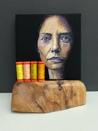 Crocheted portrait of late husband from blurry photo