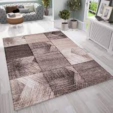 So rather than warming a room, the carpet just flustrates the efforts of heat in the room to escape. Living Room Rugs Modern Rugs Bedroom Curved Lines Patterns With Defined Contour Beige Brown Color Ceres Webshop
