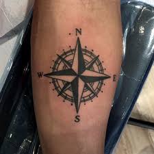 Black Compass Rose Tattoo On The Arm Compass Tattoo Men Compass Tattoo Compass Rose Tattoo