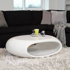 Three tier oval tempered glass coffee table, dual fishtail style tempered glass coffee table. By Elements White Oval Cocktail Table White Gloss Coffee Table Coffee Table White Coffee Table