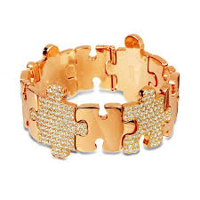 Maybe you would like to learn more about one of these? Polished Rose Gold Puzzle Bracelet Swoonery