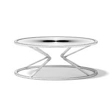 Lower shelf is covered in tightly woven rattan peel. Round Glass Coffee Table