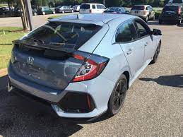 The car color appears to be more glamorous and shiny. Honda Sonic Grey Pearl Honda Civic Hatchback Honda Civic Civic Hatchback