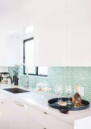 The brick accent wall give this minimalist modern look a nice punch of attitude. Pin By Anne Shirley On Kitchen Ideas Kitchen Design Kitchen Wall Tiles Turquoise Kitchen Walls