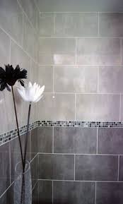 Discover the various ways that you can incorporate tile in your bathroom with helpful how tos and diy projects from diy network. 29 Ideas To Use All 4 Bahtroom Border Tile Types Digsdigs Grey Bathroom Tiles Light Grey Bathrooms Gray Shower Tile