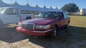 Image result for Electric Current Red 1995 Town Car