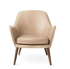 Sink into a timelessly luxe leather armchair. Warm Nordic Dwell Armchair Beige Leather Finnish Design Shop