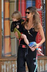 The firstborn of elle with her former husband arpad, flynn is the big brother of young aurelius cy andrea busson, who was born on february 2003 in london. Aurelius Cy Andrea Busson Celebrity Baby Names Namecandy Com