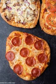 Leave the dough a bit thicker, brush with oil and stud with rosemary sprigs. Homemade Flatbread Pizza Easy Homemade Pizza Recipe