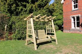 The quality of the parts was good and everything fitted together smoothly. Pergola Swing Wooden Garden Swinging Seat Hammock With Trellis