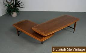 Descubre los asientos, mesas, muebles de almacenamiento y más de nuestras colecciones de piezas vintage y contemporáneas. Retro Lane Acclaim Pivoting Boomerang Coffee Table