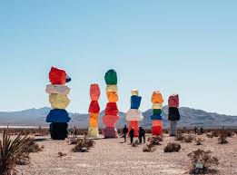 Created by renowned swiss artist ugo rondinone, you'll find seven magic mountains outside of las vegas, nevada. How To Visit Seven Magic Mountains Colorful Rocks Near Vegas Come Join My Journey