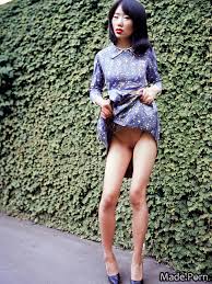 Porn image of asian playful upskirt 18 futanari looking at viewer 70s  created by AI