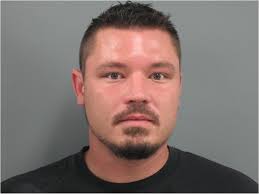 Man charged with killing wife