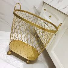 Buy metal laundry laundry baskets and get the best deals at the lowest prices on ebay! Modern Golden Fashion Metal Gold Color Dirty Clothes Storage Handle Wheel Laundry Basket Home Creative Organizer With Wheel W Decorative Shelves Aliexpress
