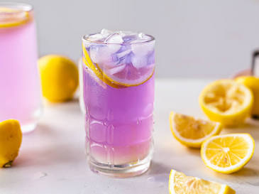 Adding lemon turns the tea purple, AI generated