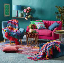 Nothing Is More Welcoming Than A Tastefully Placed Splash Of Colour Or 20 Right This Season S Living Room Decor Inspiration Chic Living Room Boho Living Room