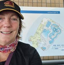 Is it possible to take photos at postcard stands?