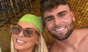 Love Island footballer Tom Clare's sister speaks out as furious fans demand  he exits villa