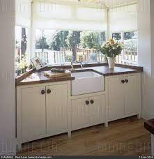 Kitchen sink bay window ideas. Stock Image Bay Window Of Kitchen With Wooden Worktop And Belfast Sink Built In To White Cupboard Unit Kitchen Sink Window Kitchen Design Kitchen Bay Window