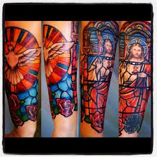 Stained glass refers to glass that has been colored by metallic oxides during the manufacturing process. Stained Glass Tattoos Tattoo Artists Inked Magazine Tattoo Ideas Artists And Models