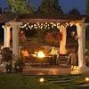 Swinging benches around fire pit. 3