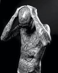 Kardashian, 41, shared photos on wednesday using a tattoo. Travis Barker