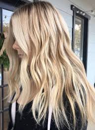 Every hair color will find its place under the sun this year, from soft balayage and ombre blends in natural hues of blonde, brown and red through more pronounced gray, caramel, auburn and burgundy shades to completely unnatural neon and pastel hair dye colors. Best Hair Color Ideas 2017 2018 Beachy Blonde Waves And Highlights Trendyideas Net Your Number One Source For Daily Trending Ideas