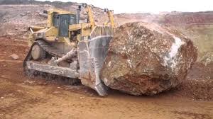 D11 the d11 is a 1.1 l; Cat D11 Pushing A Huge Boulder Heavy Equipment Earth Moving Equipment Caterpillar Bulldozer