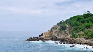 Puerto escondido is a small port and tourist center in the municipality of san pedro mixtepec distrito 22 in the mexican state of oaxaca. Puerto Escondido Mexico Suitcase Magazine