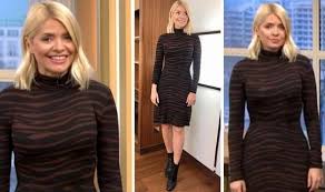 Tv presenter holly willoughby regularly turns heads with her outfit choices on this morning and the recent series of dancing on ice,** **with the help of her stylist angie smith. Holly Willoughby News This Morning Host Shows Off Her Curves In Bodycon Tiger Print Dress Express Co Uk