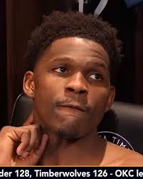 Kyrie Irving with Malika Andrews