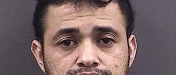 Police: Man arrested after seen breaking into vehicle