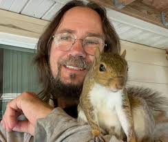 Squirrel visits daily for nuts