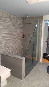 This setup blends the ease of a sliding glass shower door with the versatility of a shower enclosure. Shower Bath Enclosures In Newburyport Ma Merrimack Valley Glass Mirror