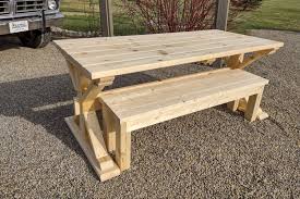 This one is so unique and so perfect if you don't really have the space for a more traditional picnic table in the backyard. The Most Unique Diy Trestle Picnic Table Ever Strong Sturdy Beautiful
