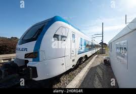 Ammerbuch, Germany. 14th Oct, 2021. An electronically powered train is  charged at a fast-charging station on a siding at Ammerbuch-Pfäffingen  station. Stadtwerke Tübingen presented its 