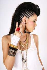 Let your hair fall on your back and use a curling iron to build some curls for the tips. 10 Trendy Funky Hairstyles For Long Hair Funky Hairstyles For Long Hair Long Hair Mohawk Mohawk Hairstyles