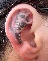 weird but cool but i do love me some mexican folk art ear tattoo bet that hurt ohren tattoos ohr tattoo tattoo ohr