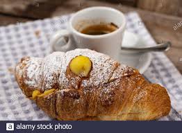 The most typical would be jam. Italian Coffee Cornetto Croissant And Pastries Breakfast Lunch Caffe Pot And Cups Food Display Cream Veneziana Stock Photo Alamy