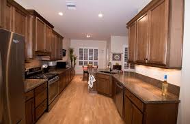 Prices and availability of products and services are subject to change without notice. Kraftmaid Maple Cognac Cabinetry With Lg Viatera Kilauea Kraftmaid Kitchens American Kitchen Design Kraftmaid Kitchen Cabinets