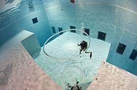 10 Mind Blowing Hotel Pools Around The World Deepest Swimming Pool Diving Diving Board