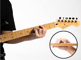 Resting the guitar in your lap typically provides more support and keeps the neck stable, enabling you to maneuver much more easily. Guitar Technique For Beginners 1 Hands Fingers And Strengthening Exercises Guitar Com All Things Guitar