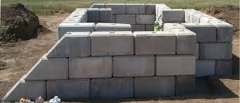 Gravity concrete retaining walls are constructed using large boulders or masses of precast concrete. Large Concrete Block Retaining Walls Ibrs Inc