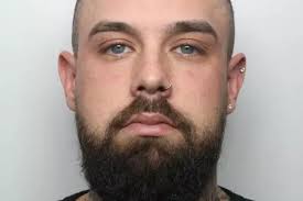 Father and sons barge into store and attack man in front of his  seven-year-old son