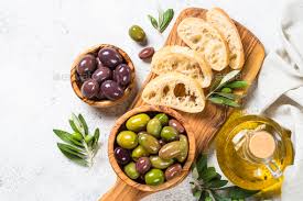 Olives Ciabatta And Olive Oil On White Background