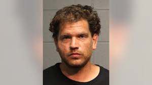 Man charged with hitting Chicago police officer in the face