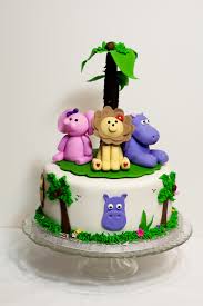 The elephant figurine on the top is created out of chocolate. Blog Posts Sweets By Selina Dallas Custom Cakes