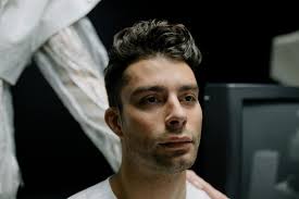 Stylish ethnic man posing