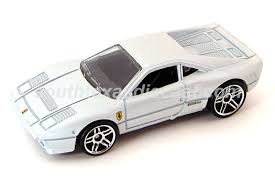 Yellow, w/ferrari emblem on sides & front, black interior, grey malaysia base, w/rrex's. Hot Wheels Guide Ferrari 288 Gto